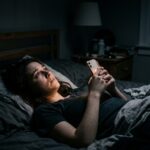 Person_lying_awake_in_bed_202608110948